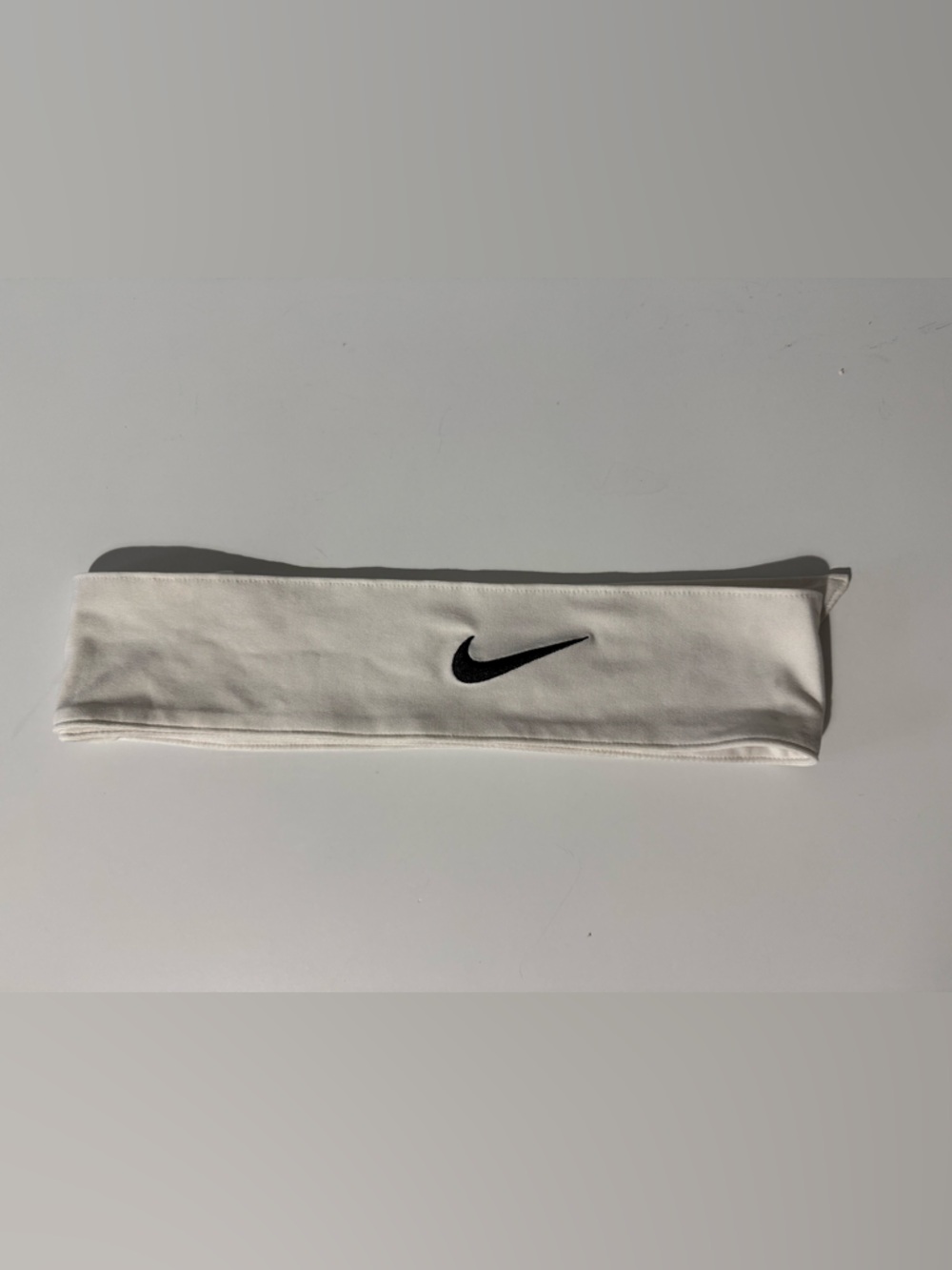 Nike White Stretch Athletic Headband with Black Swoosh